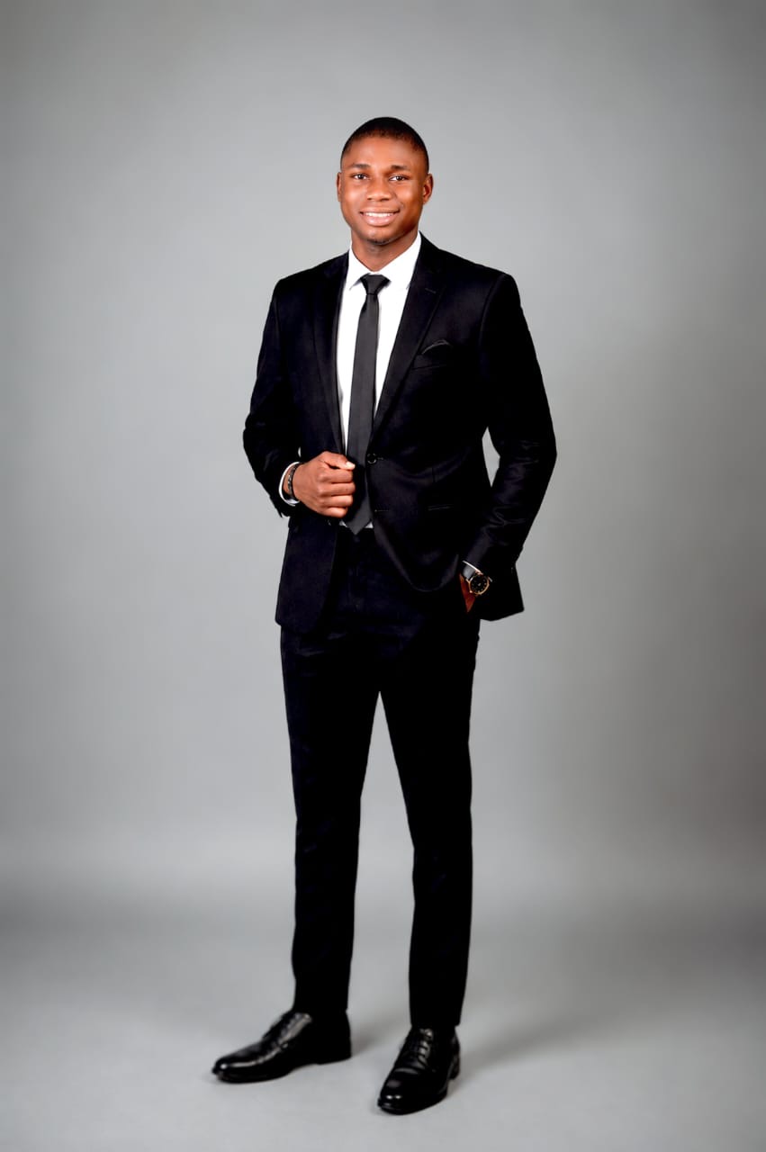 Shopify Marketing Team Lead in a black suit